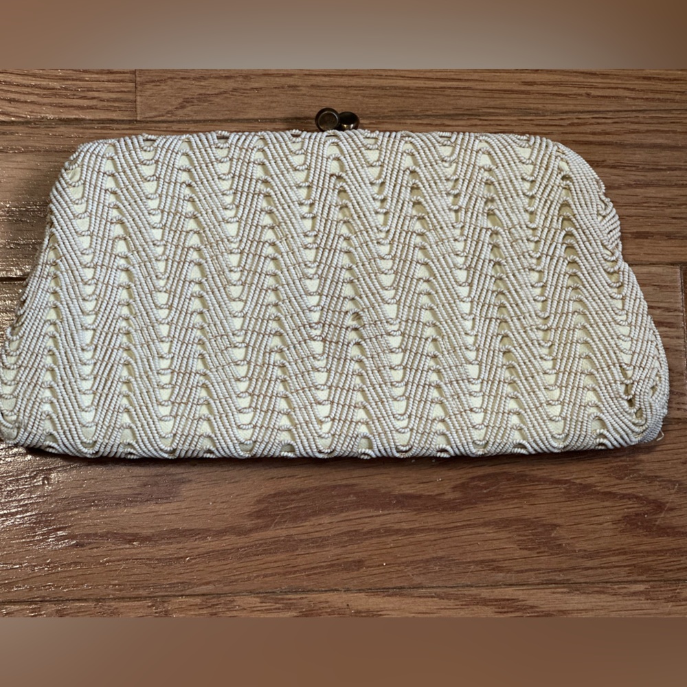 Garay vintage clutch gold tone/cream beaded with silk inner lining.